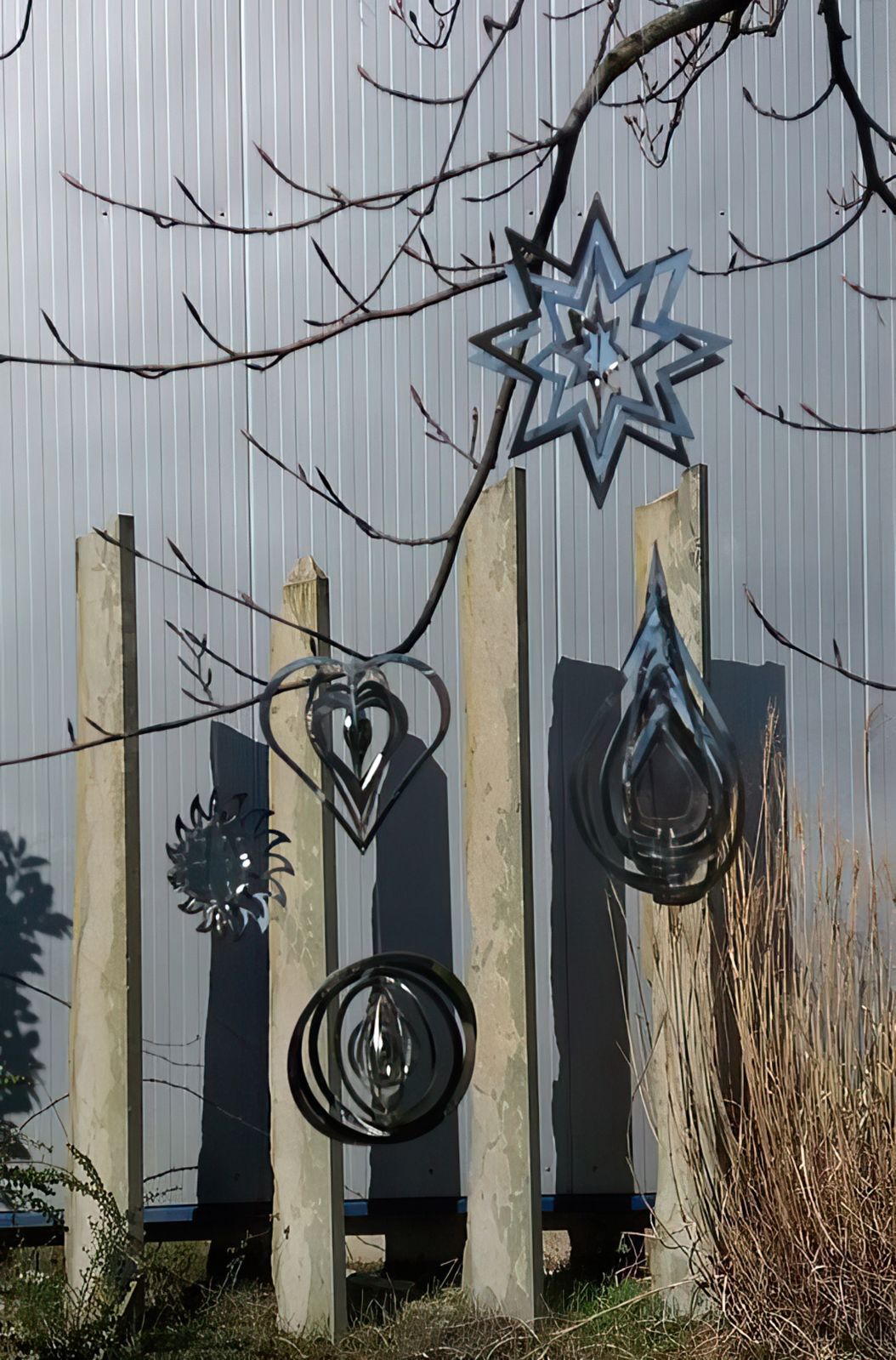 Elliot - Metallwindspiel hängend Edelstahl-Stern 20 cm 