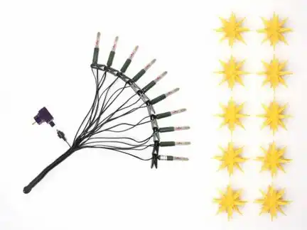 Herrnhuter Sternenkette / Lichterkette mit 10 Sternen Ø 13 cm Kunststoffstern - gelb LED Wunderschöne und sehr hochwertige Weihnachtsstern-Lichterkette für Innen und Außen - das Original mit 25 Zacken